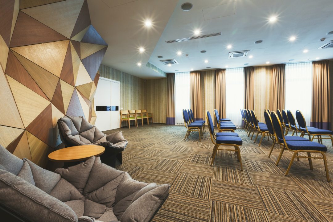 modern-hotel-lobby-with-abstract-wooden-wall